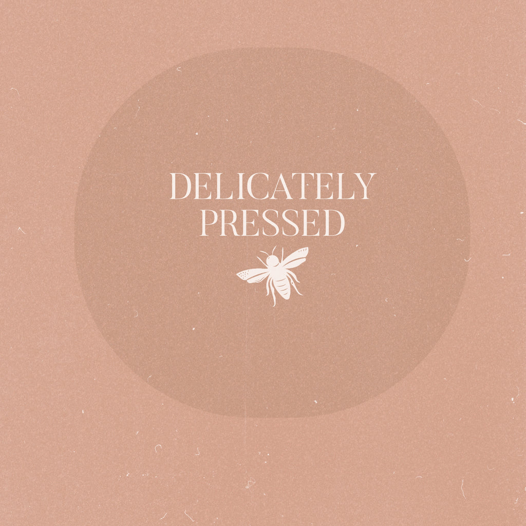 delicately pressed market Logo