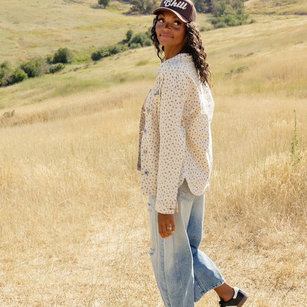 This funky little jacket features dainty florals, functional buttons, and a rounded hemline. Throw this on over your fav tees and sweaters this fall! The Tully Floral Jacket is fun, flirty, and perfect for the change of seasons.