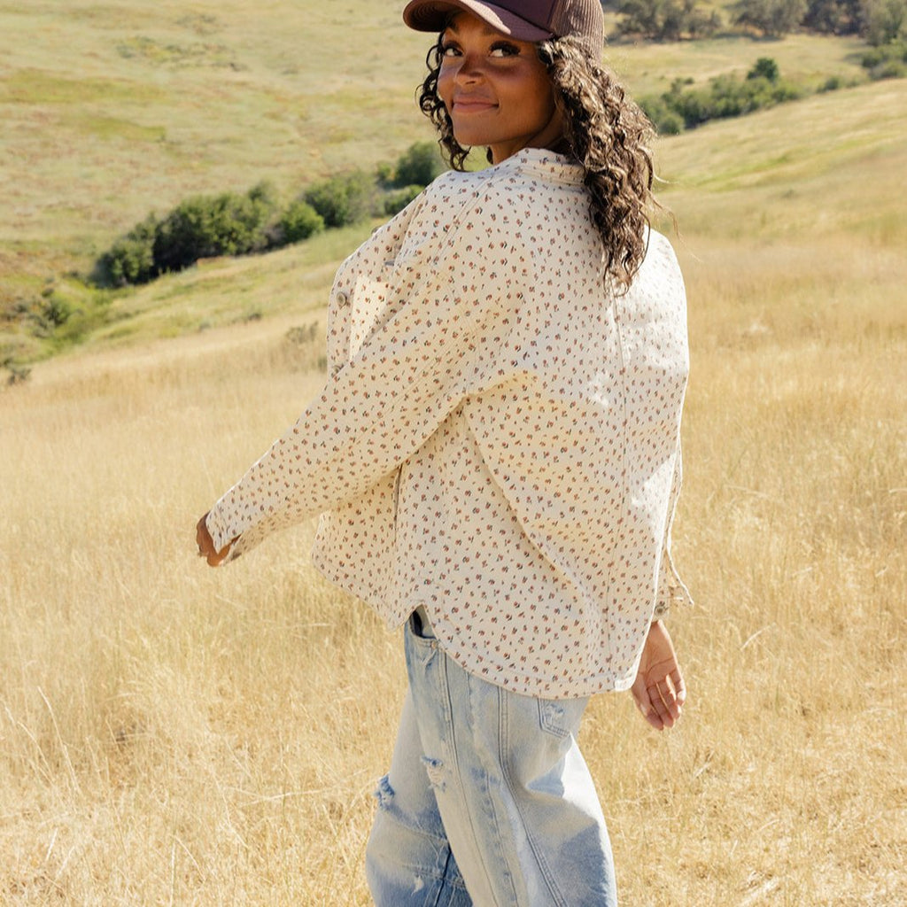 This funky little jacket features dainty florals, functional buttons, and a rounded hemline. Throw this on over your fav tees and sweaters this fall! The Tully Floral Jacket is fun, flirty, and perfect for the change of seasons.