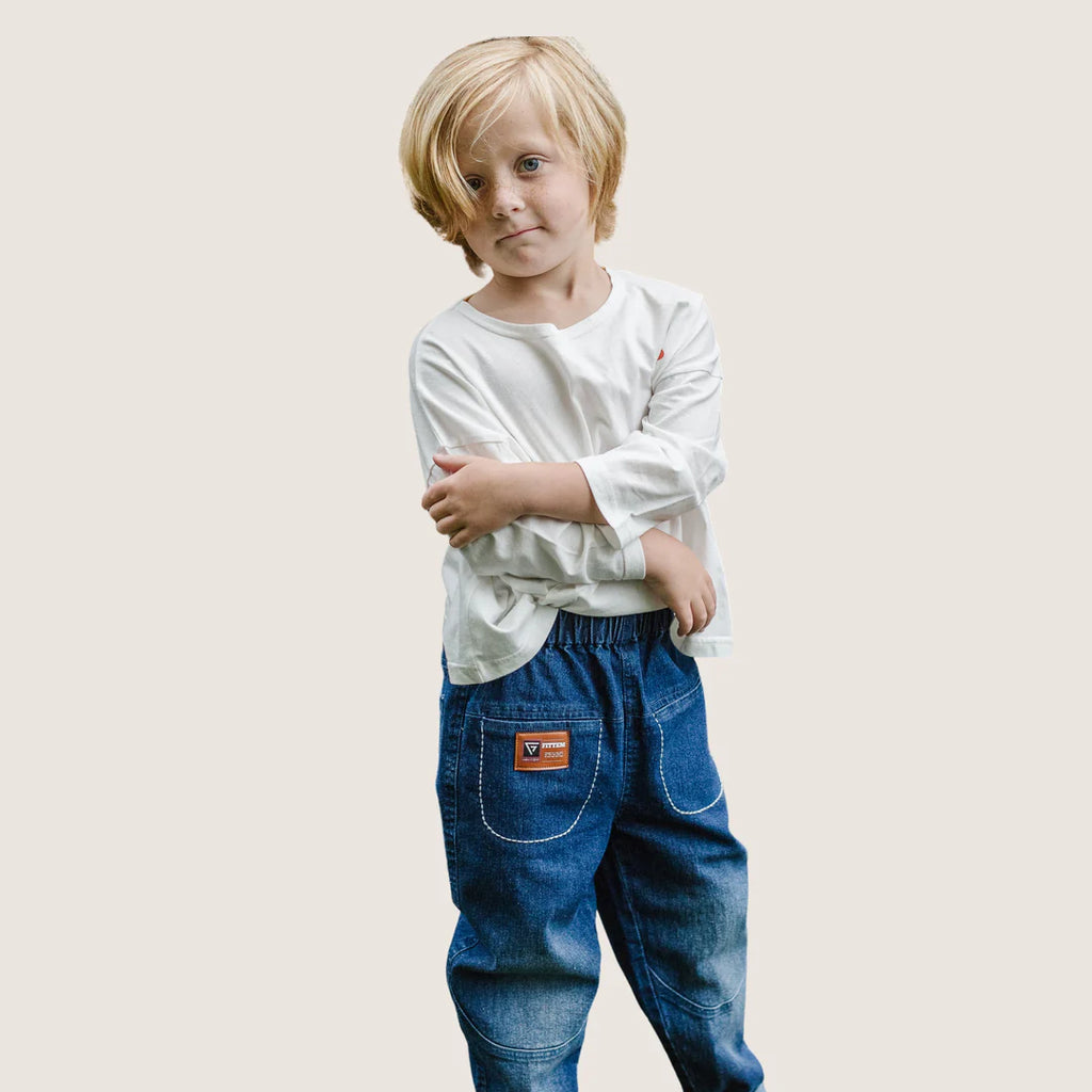 Chic, modern, high fashion-influenced design you'll appreciate. Your child will simply love the easy, roomy comfort - and choose them for school or playtime again and again. (Not to worry: The Easy Pant can stand up to endless washes.