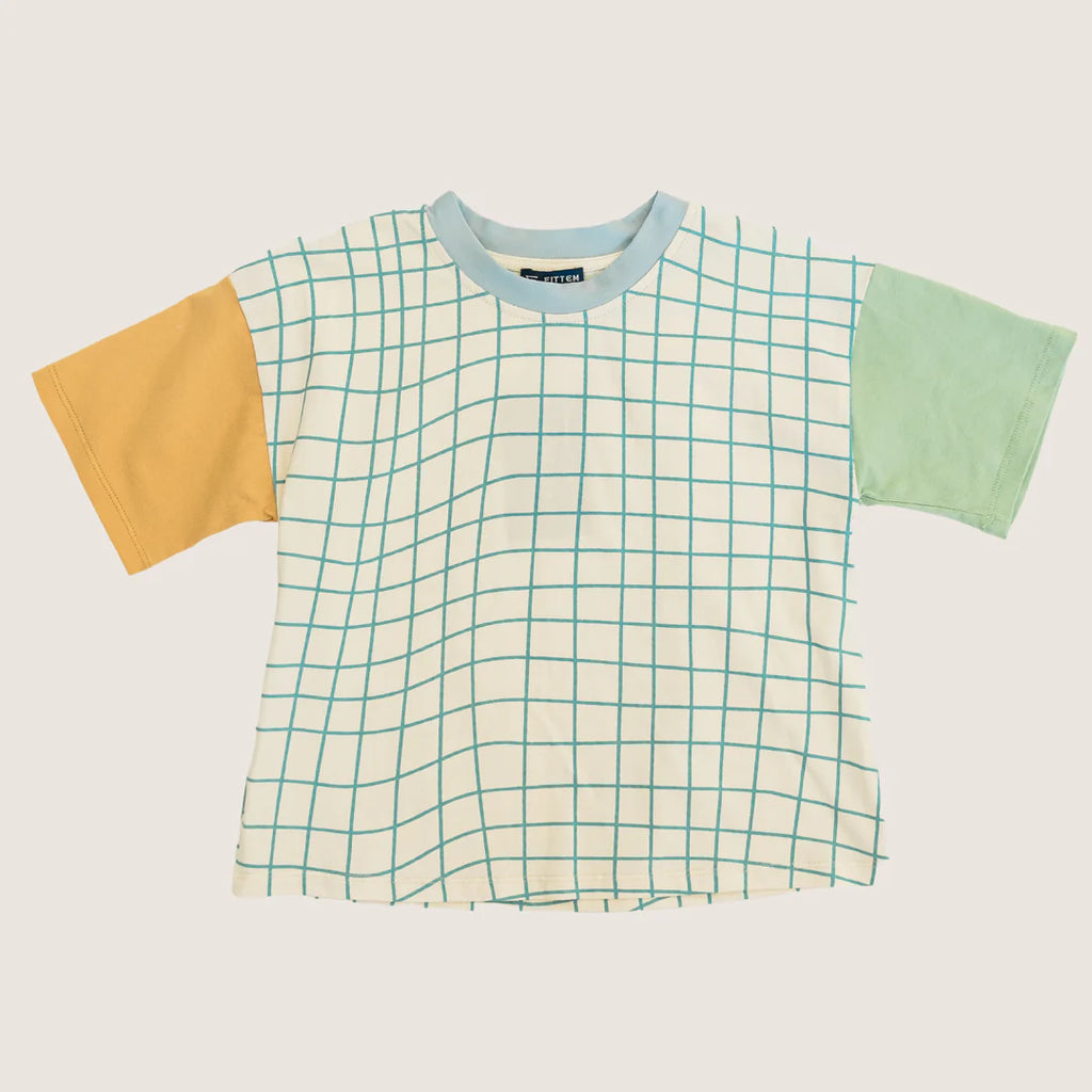 Our unique tee is crafted from a sublime blend of 95% cotton and 5% spandex, making it the perfect companion for your child's everyday adventures. The shirt’s relaxing ivory and calming blue checkered pattern is contrasted with sunny yellow and vibrant green sleeves, creating a kaleidoscope of colors that mirror the joys of childhood.