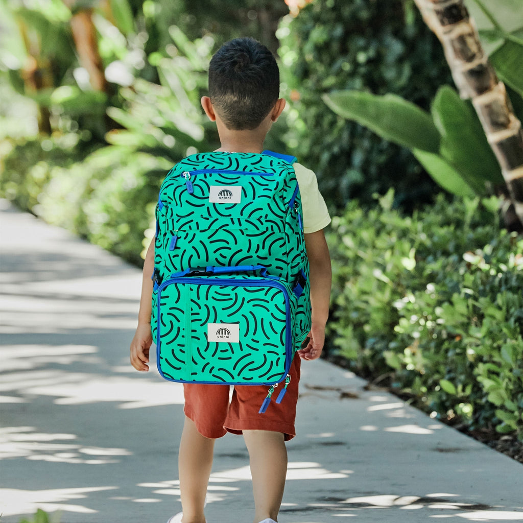 Take flight with the Ellis Lunch Bag in Brush Strokes! This unique lunch bag features a playful brush strokes design, perfect for kids or anyone with a sense of adventure. Keep your lunch fresh and cool while showing off your fun personality.