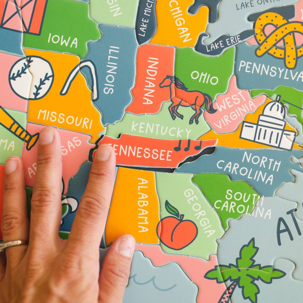 Explore the United States of America with our one-of-a-kind, hand-drawn puzzle. The uniquely state-shaped pieces and beautifully illustrated designs make this puzzle a fun and educational activity for kids and adults alike. With only 110 pieces, it's the perfect gift for children and a great addition to any teacher's classroom.