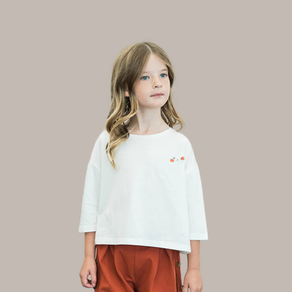 Designed for both boys and girls, this unisex shirt is the go-to piece for any occasion, be it casual hangouts, school events, or weekend fun.