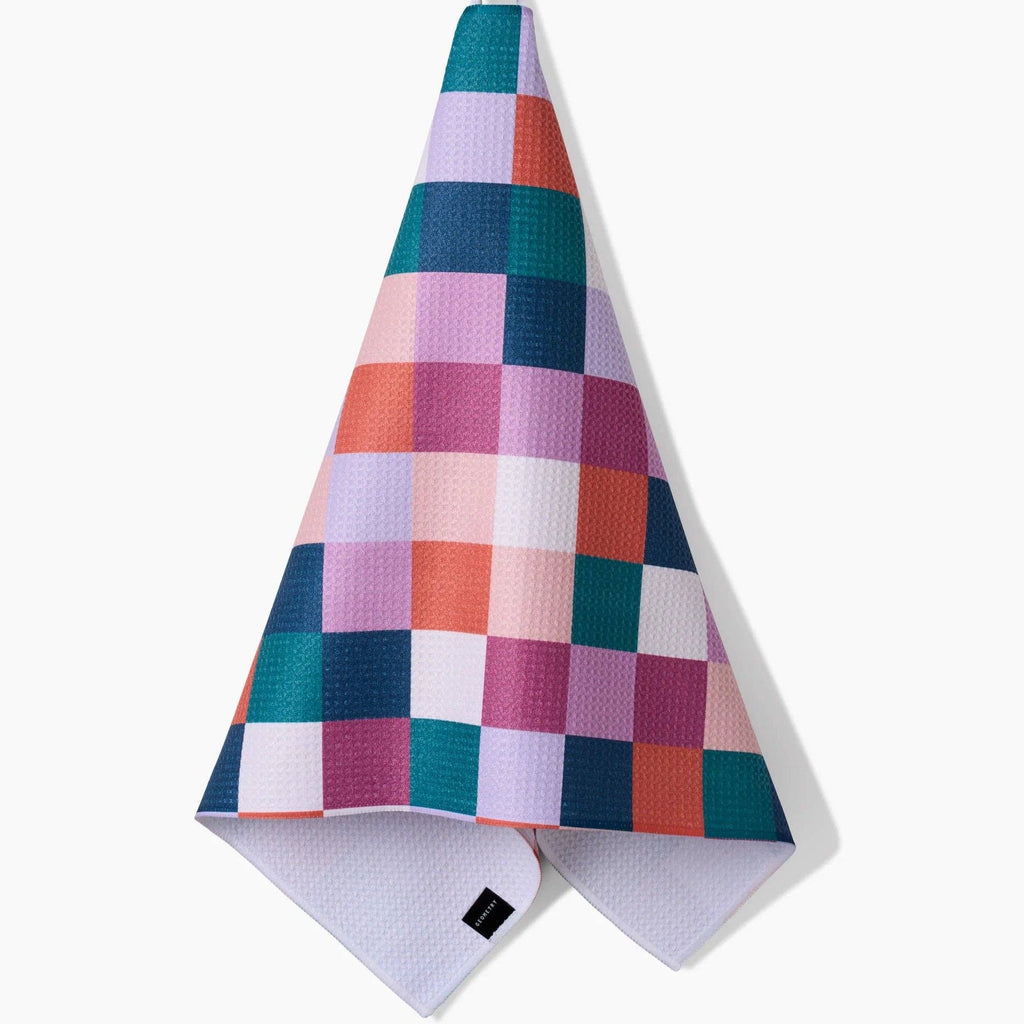 blues, pinks, and orange checkered tea towel