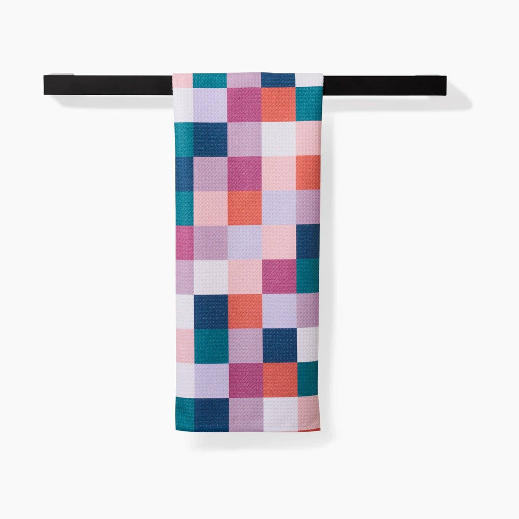 blues, pinks, and orange checkered tea towel