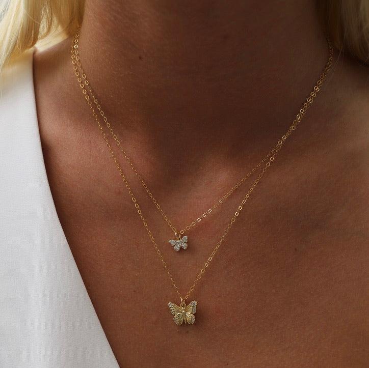 Delicate and sweet, this cubic zirconia butterfly necklace is a larger version to our Miniature CZ Butterfly Necklace. Butterflies symbolize transformation and hope which will make this a beautiful addition to your collection