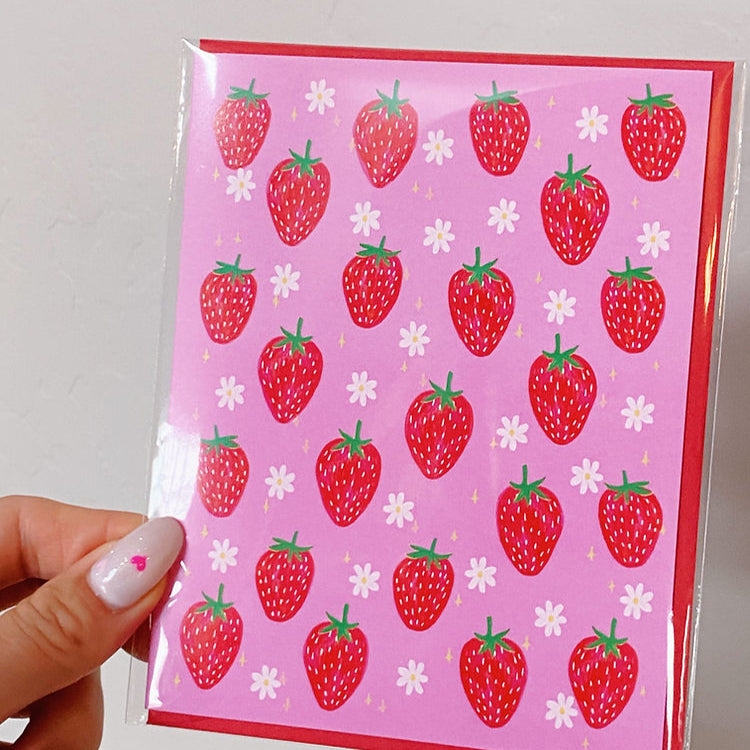 pink card with strawberries and daisies