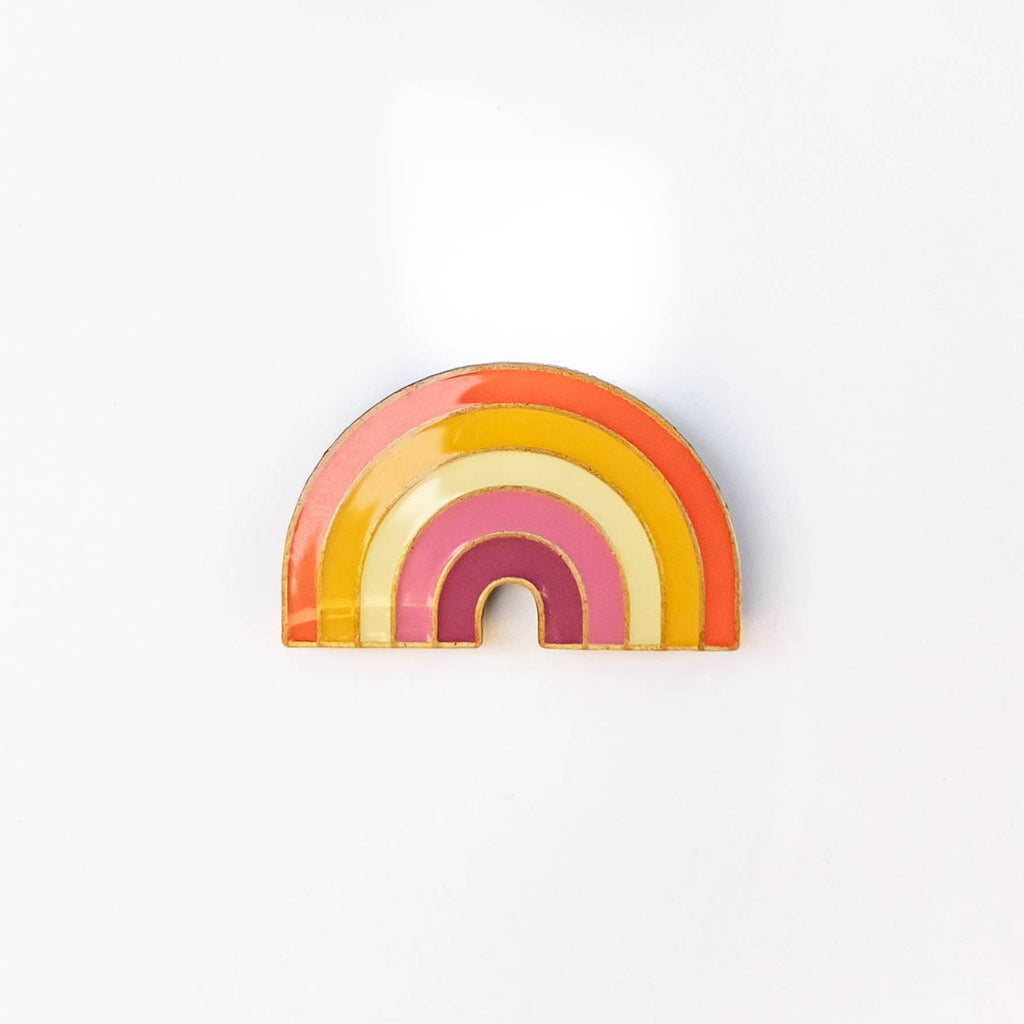 These LGBTQ+ Pride Rainbow pins have an antique brass and glossy epoxy finish for a classy vintage aesthetic. This pin features a retro style lesbian rainbow design. Enamel pins are perfect for wearing on jackets, backpacks, bags, and other accessories. They can also be used to decorate pin boards, cork boards, and other surfaces. Enamel pins are also a popular choice for collectors, as they can be used to create a unique and personal collection!  Size: 1.25" soft enamel pin