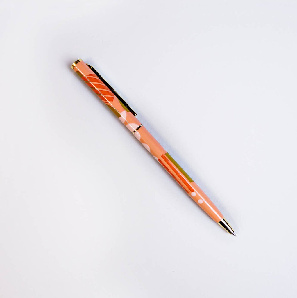 Make writing a little more fabulous with this boldly orange, spots &amp; stripes printed metal pen with real gold plated trim. It has a fine ball point with black ink and it's refillable! Refills sold separately.