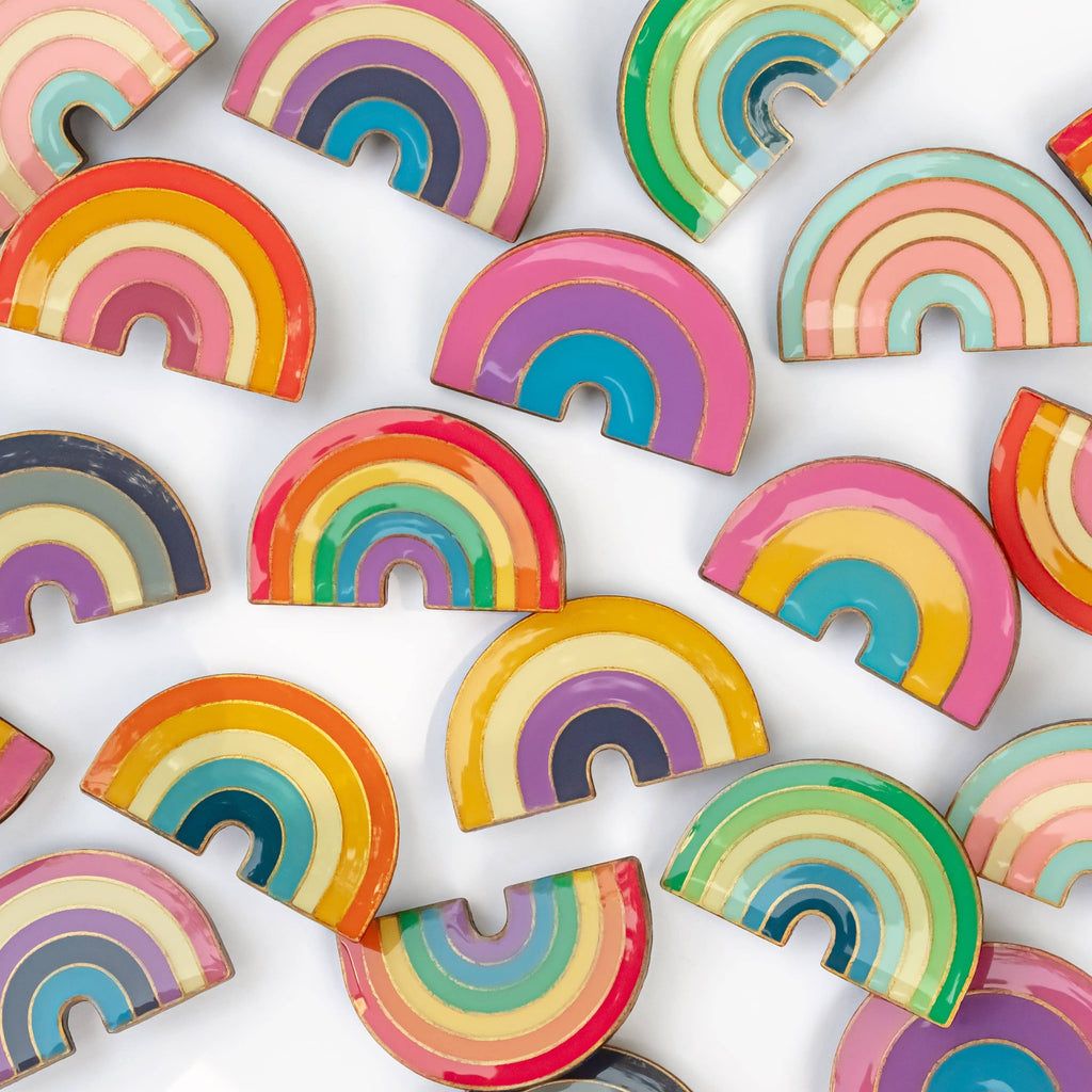 These LGBTQ+ Pride Rainbow pins have an antique brass and glossy epoxy finish for a classy vintage aesthetic. This pin features a retro style bisexual rainbow design. Enamel pins are perfect for wearing on jackets, backpacks, bags, and other accessories. They can also be used to decorate pin boards, cork boards, and other surfaces. Enamel pins are also a popular choice for collectors, as they can be used to create a unique and personal collection!  Size: 1.25" soft enamel pin