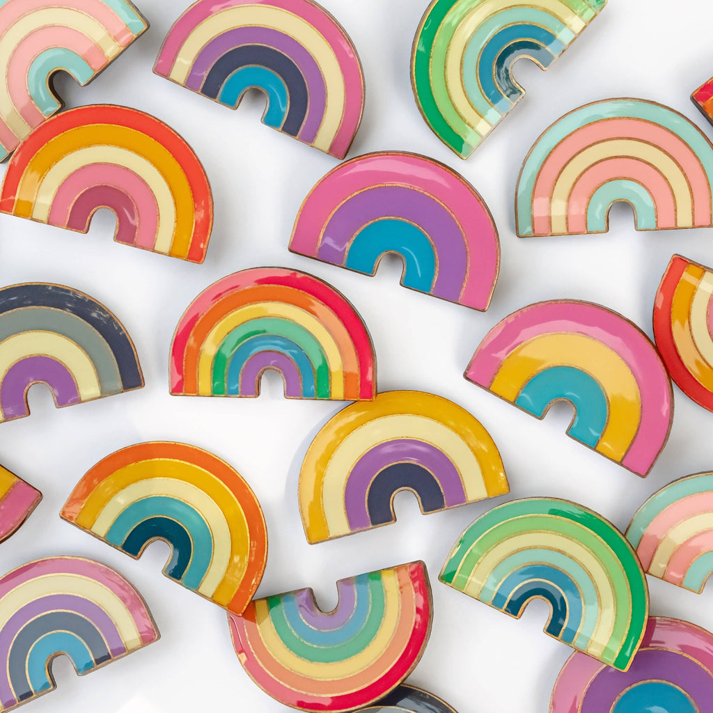 These LGBTQ+ Pride Rainbow pins have an antique brass and glossy epoxy finish for a classy vintage aesthetic. This pin features a retro style lesbian rainbow design. Enamel pins are perfect for wearing on jackets, backpacks, bags, and other accessories. They can also be used to decorate pin boards, cork boards, and other surfaces. Enamel pins are also a popular choice for collectors, as they can be used to create a unique and personal collection!  Size: 1.25" soft enamel pin