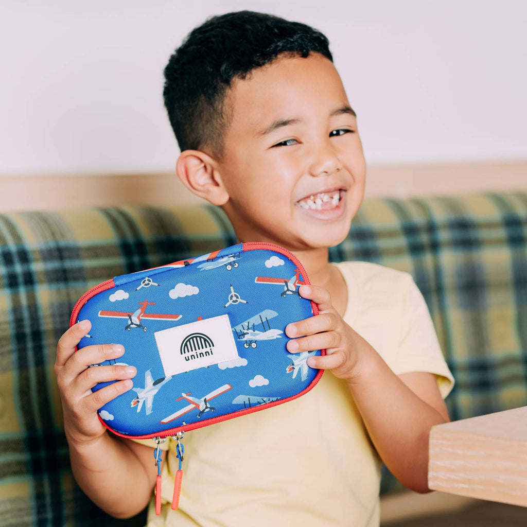 Keep your writing tools organized and stylish with the Arden Pencil Case in the Airplane design. This quirky and playful case adds a touch of fun while holding all your pencils, pens, and markers in place