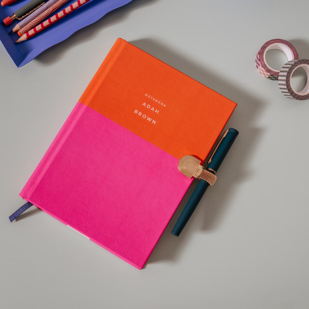 Keep your pen and your pages together forever. Papier's brass pen clips can be attached the cover of any of our notebooks, journals or planners. The clip is adjustable, with a stretchy slot to accommodate pens and pencils of all sizes, so you’ll never misplace them again. A wonderful gift for any paper person.