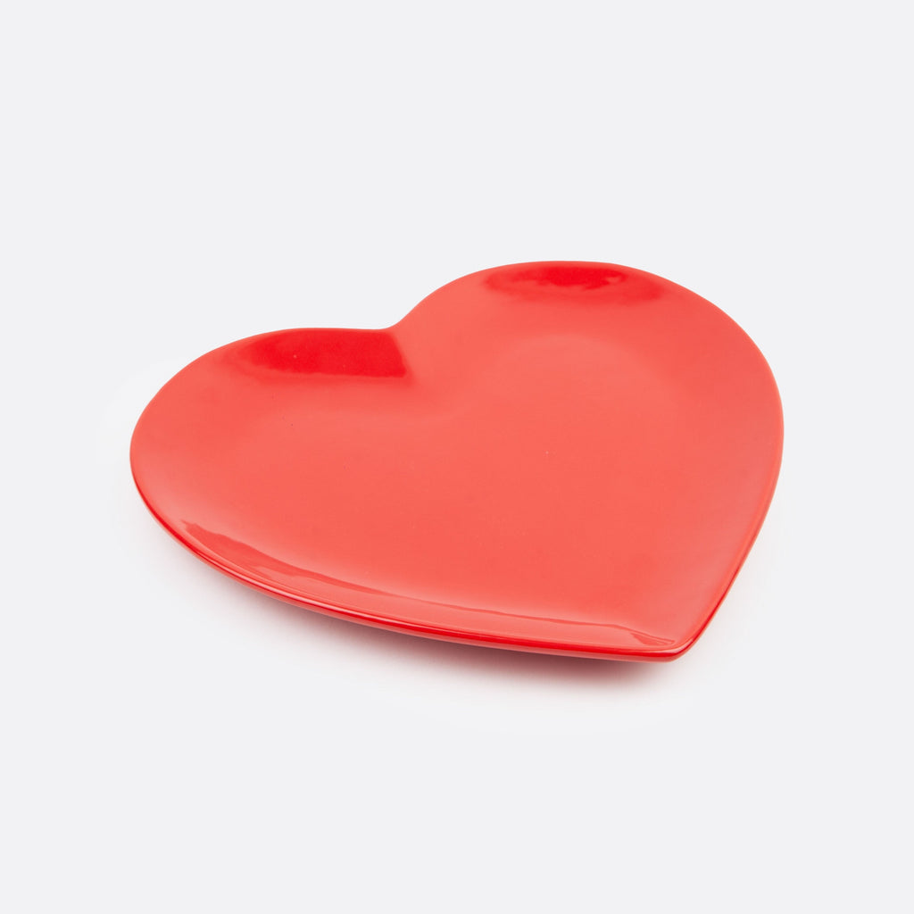 Indulge in luxury with our Red Large Heart Plate. Crafted with exquisite detail and a vibrant red hue, this plate will add a touch of elegance to any dining experience. Perfect for special occasions or everyday use, this plate is sure to leave a lasting impression. Embrace sophistication and elevate your dining table with this stunning addition.