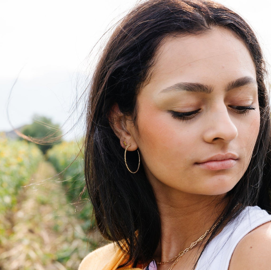 Extremely light weight  30 mm Available in gold 14k gold filled means this baby is meant to last!&nbsp; (Check out our&nbsp;jewelry care guide&nbsp;for how to make sure you get max wear on these!) Hypoallergenic Earrings are slightly malleable.&nbsp; You will be able to shape them into place and pull them a bit to get the look you want