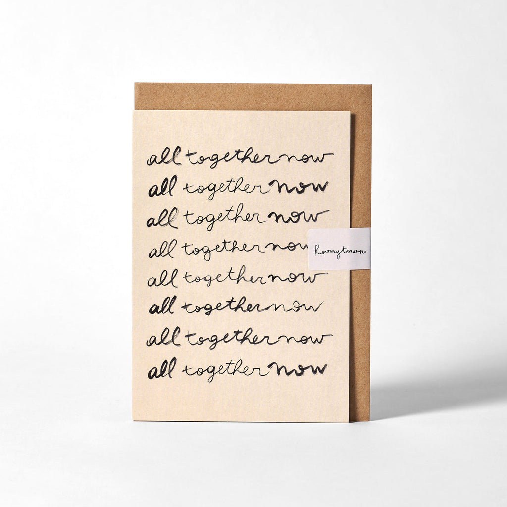 A6 greetings card featuring original 'All Together Now' hand lettering designed by Roomytown’s own founder Lorena Siminovich. Printed and designed in the UK using fully recyclable FSC card sourced from sustainably managed forests.