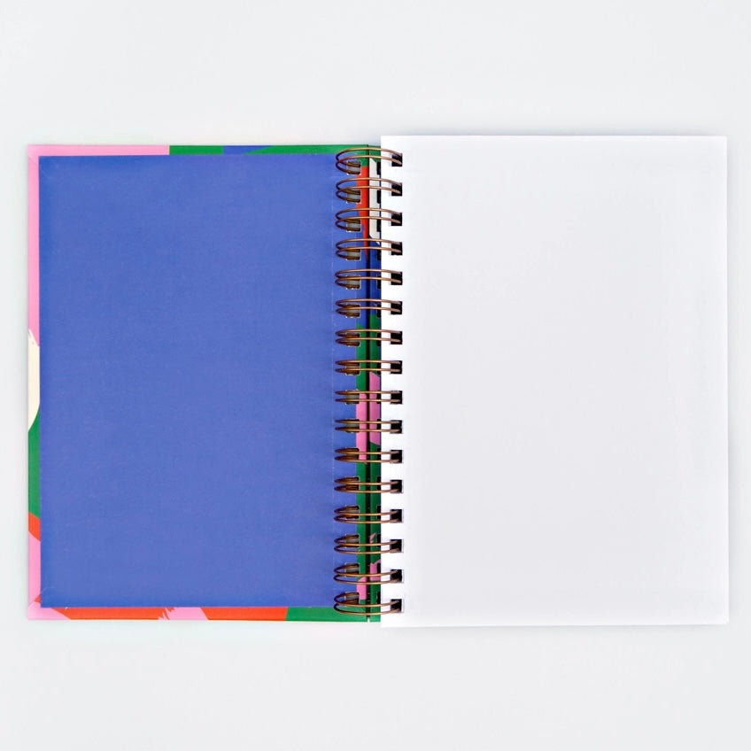 This A5 size (14.8cm x 21cm) wire bound sketchbook is made in the UK and hand-finished in a London studio. It has a rigid hard cover, and the internal pages are a lovely heavy 120gsm textured FSC certified paper. There are 160 inside pages that are plain, making them perfect for sketching or painting. It has an elastic closure and a back pocket to keep loose papers in place.