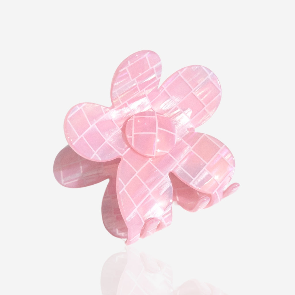 Get your hair ready for any occasion with our Flower Hair Claw in a unique pink tiled design. The large flower design adds a playful touch to your hairstyle.