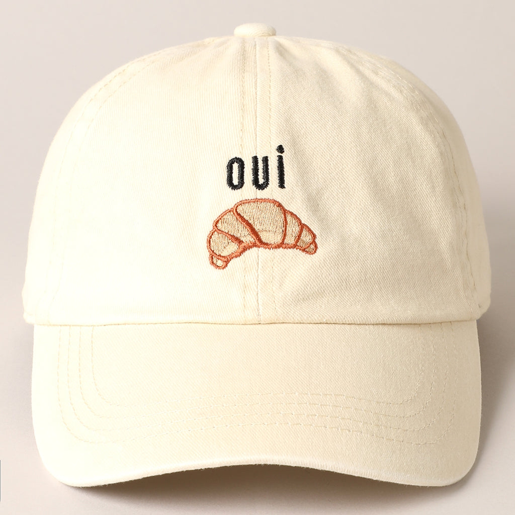 Channel your love for croissants while staying stylish and protected from the sun. Perfect for any outfit, this beige cap adds a touch of playfulness and charm. Vive la France.