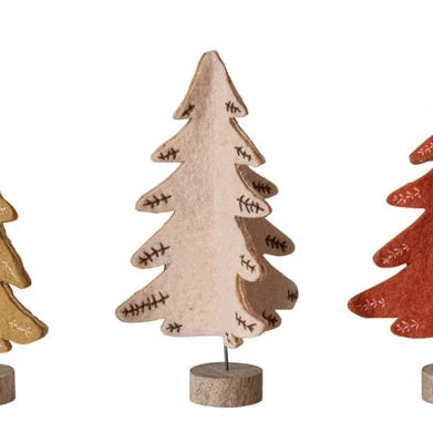 Get festive with our Wool Stitched Felt Trees! These earthy colored trees, made from soft wool, will add a touch of coziness to your holiday decor. Each tree features contrasting edge stitching for a unique look. No two trees are alike. (Did we mention they're super cute?)

Size

5-1/4" Round x 8"H