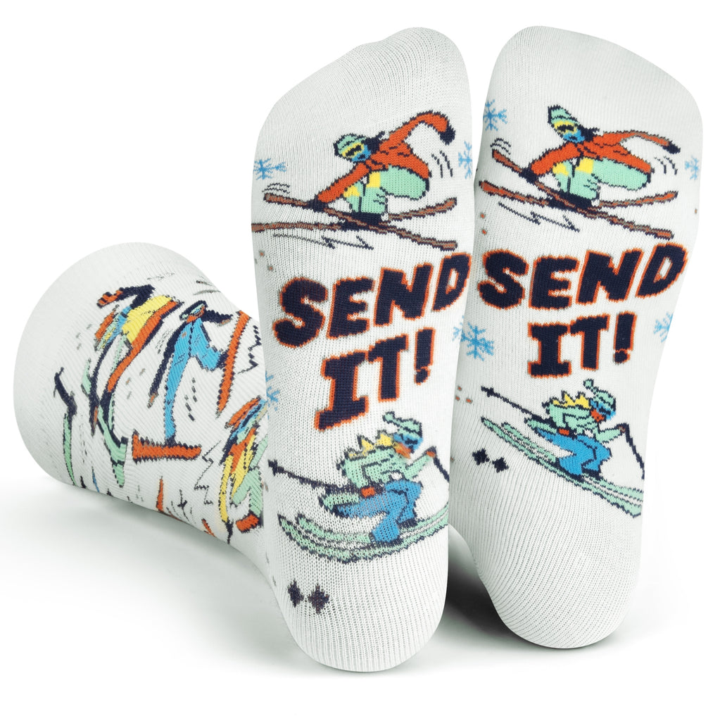 Get ready to shred with the Send It! Ski Socks, the ultimate accessory for skiers. These aren’t just any ski socks; they’re a statement. With a vibrant ski themed design featuring skiers pulling off jaw dropping tricks, they scream style and skill. And the kicker is a secret message hidden on the bottom of the feet that reads “Send It!” – a rallying cry for those who dare to push the limits.