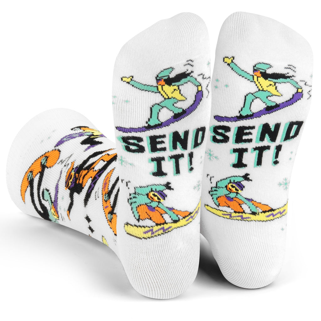 Get ready to roll with the Send It! Snowboard Socks, the ultimate accessory for riders who live to shred. These aren’t just any socks; they’re a statement. With a vibrant snowboard themed design featuring snowboarders pulling off jaw dropping tricks, they scream style and skill. And the kicker is a secret message hidden on the bottom of the feet that reads “Send It!” – a rallying cry for those who dare to push the limits.