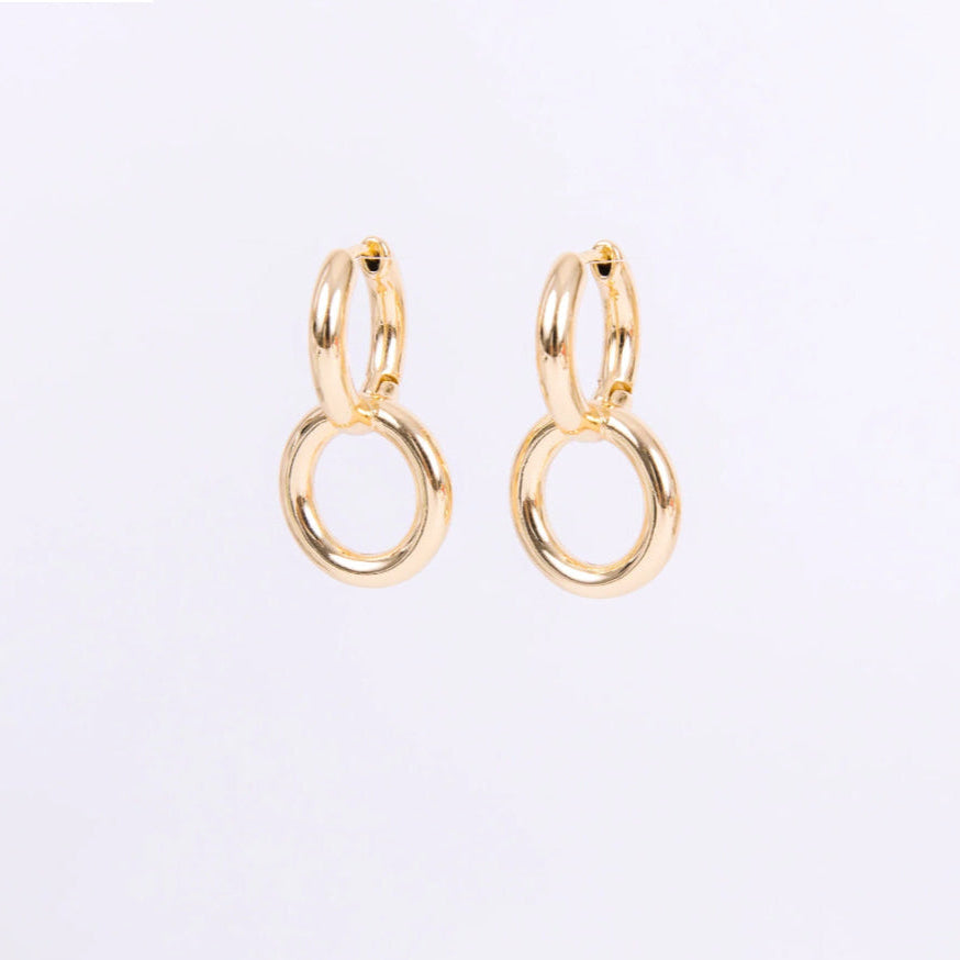 These loop-de-loop huggies are a roller coaster of fun details! They are 10 mm fitting in your piercing but they are 3 mm thick all the way around each loop so they are a great lightweight statement hoop!
ITEM DETAILS:
10 mm huggie, 28 mm long
3 mm thick, lightweight, looping details
14k gold filled- this baby is meant to last!  (Check out our jewelry care guide for how to make sure you get max wear on these!)
925 sterling silver
Safe for sensitive skin.
Hypoallergenic