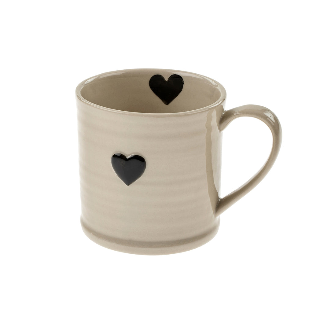 The petite Sweetheart Mug is lovingly adorned with hand painted black hearts and reminds us to savour the important things in life. Great for serving espressos or warm drinks for little ones.

Dimension: 5.3 x 3.8 x 3.8 in