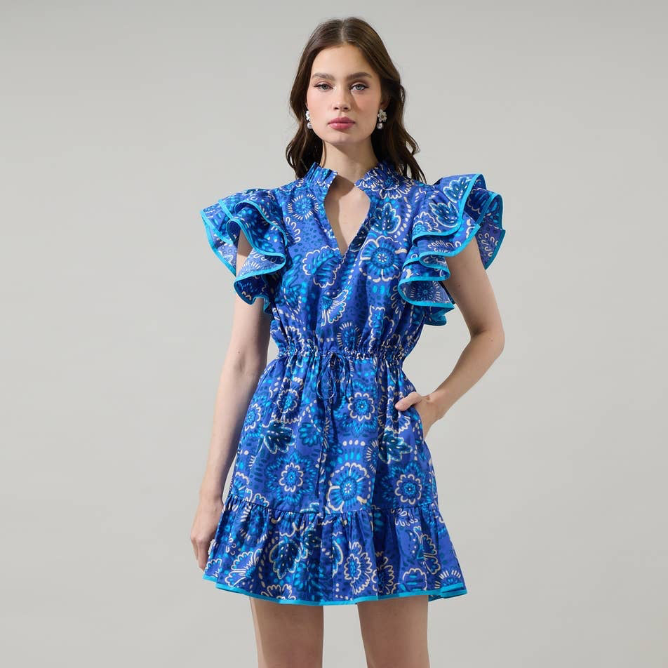 Make your style bloom in the Kenner Floral Alina Ruffle Shift Mini Dress. Dramatic ruffles around the short sleeves frame split neckline with a mock ruffle neck. The bodice has a shift design and a drawstring belt around the waist. Don’t forget to add gold accessories to match the dress.