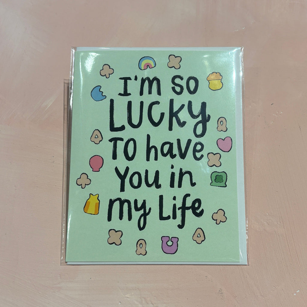 green card reading "I'm so lucky to have you in my life" with lucky charms cereal