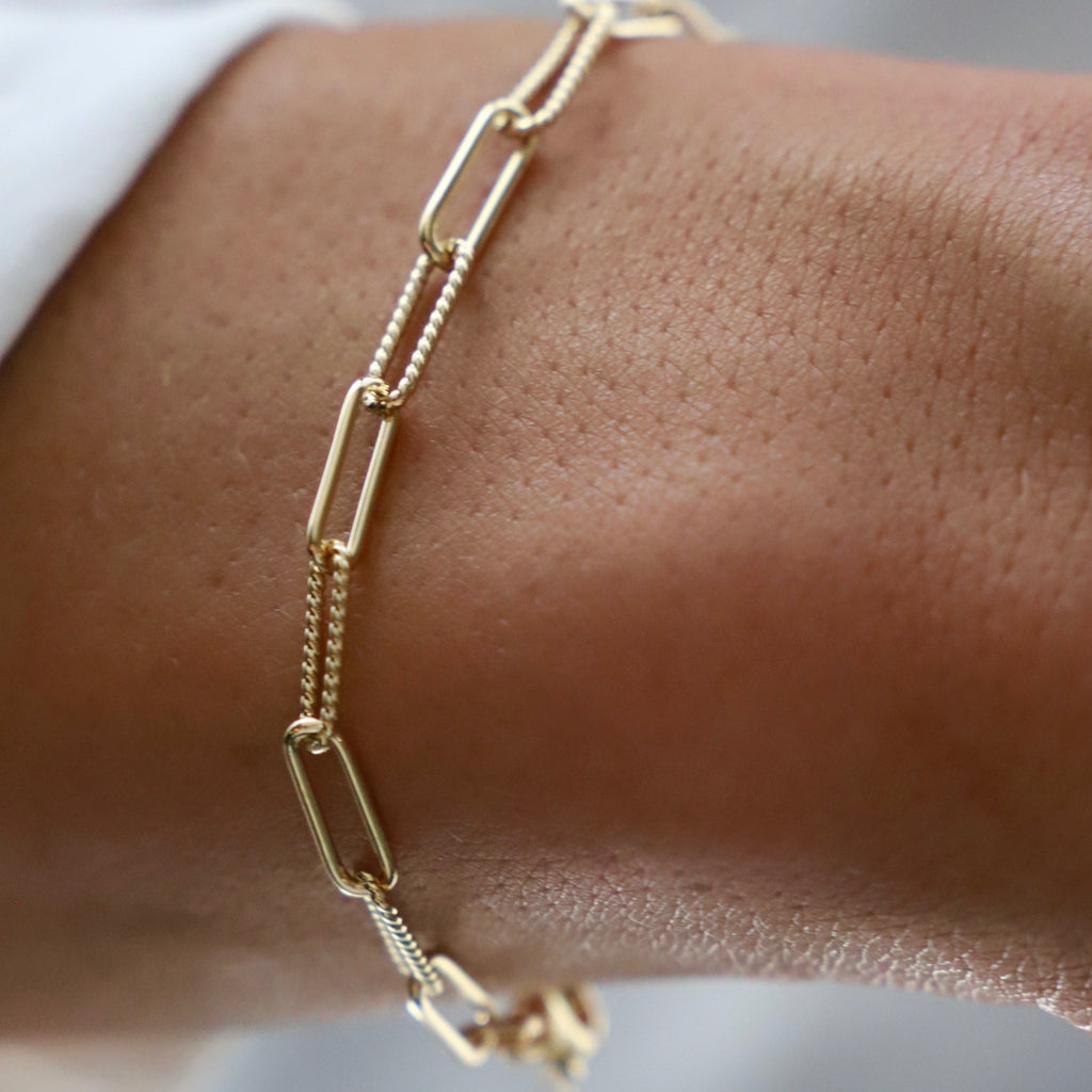 The Cecilia Paperclip Chain Bracelet screams industrial and bold! This chain adds texture to your bracelet stack while saying comfortable for everyday wear.