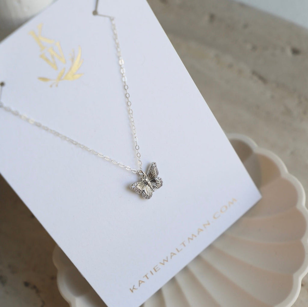 Delicate and sweet, this cubic zirconia butterfly necklace is a larger version to our Miniature CZ Butterfly Necklace . Butterflies symbolize transformation and hope which will make this a beautiful addition to your collection.