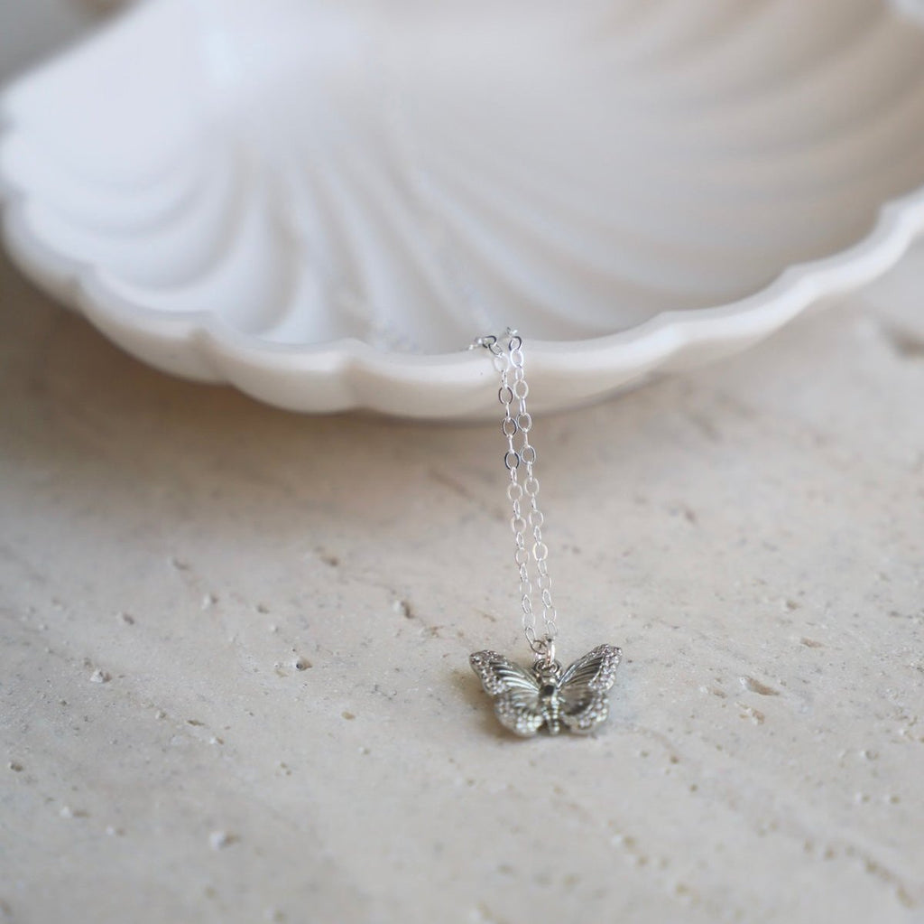 Delicate and sweet, this cubic zirconia butterfly necklace is a larger version to our Miniature CZ Butterfly Necklace . Butterflies symbolize transformation and hope which will make this a beautiful addition to your collection.