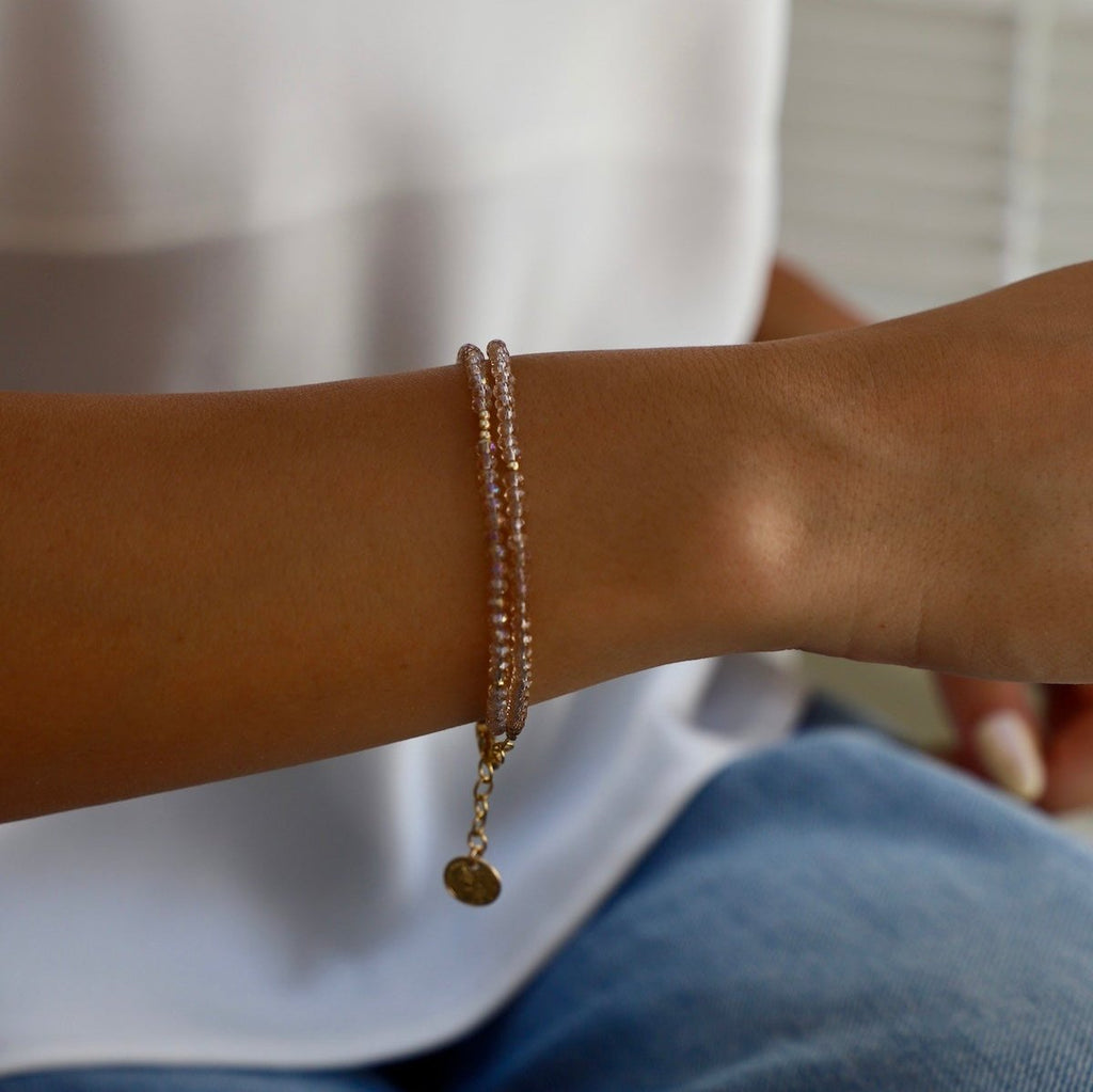 The Petite Champagne Double Wrap Bracelet with Gold Accents is the ultimate fashion accessory.