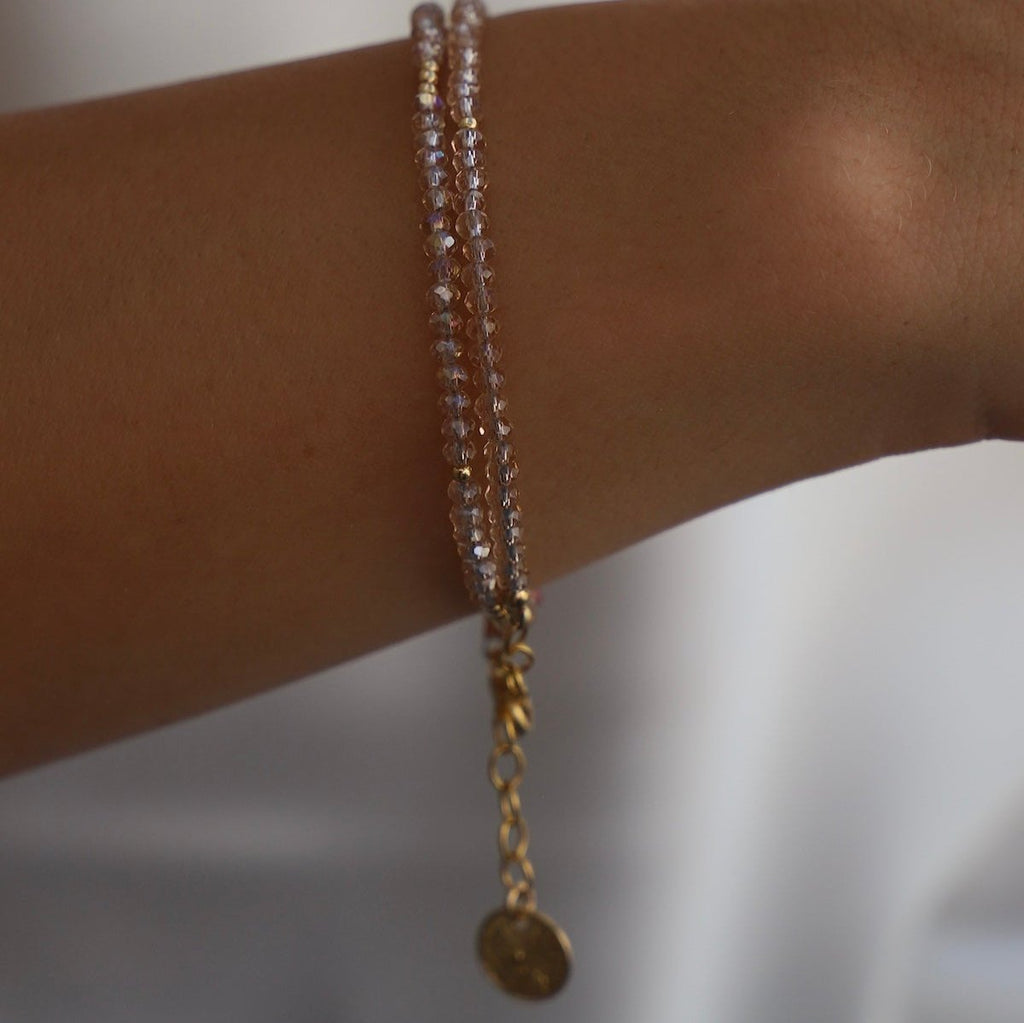 The Petite Champagne Double Wrap Bracelet with Gold Accents is the ultimate fashion accessory.