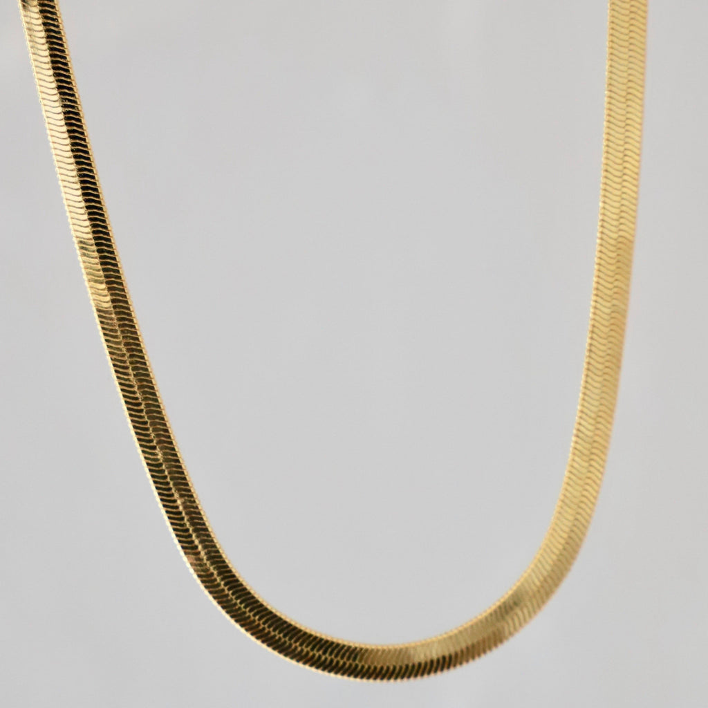 If you are looking to add a bold piece to your jewelry collection that can still be worn everyday, this is your necklace! Featuring a thick herringbone chain with a 2" extender, this necklace is one of our staples!