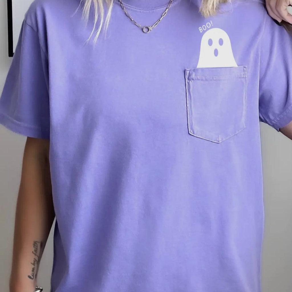 Get ready to spook up your wardrobe with this Purple Ghost T-Shirt! Made from high-quality fabric, this quirky tee is sure to be a hit. With its playful design and comfortable fit, you'll be the life of the party (or afterlife)! Don't be afraid to embrace your inner ghost with this fun and unique t-shirt.