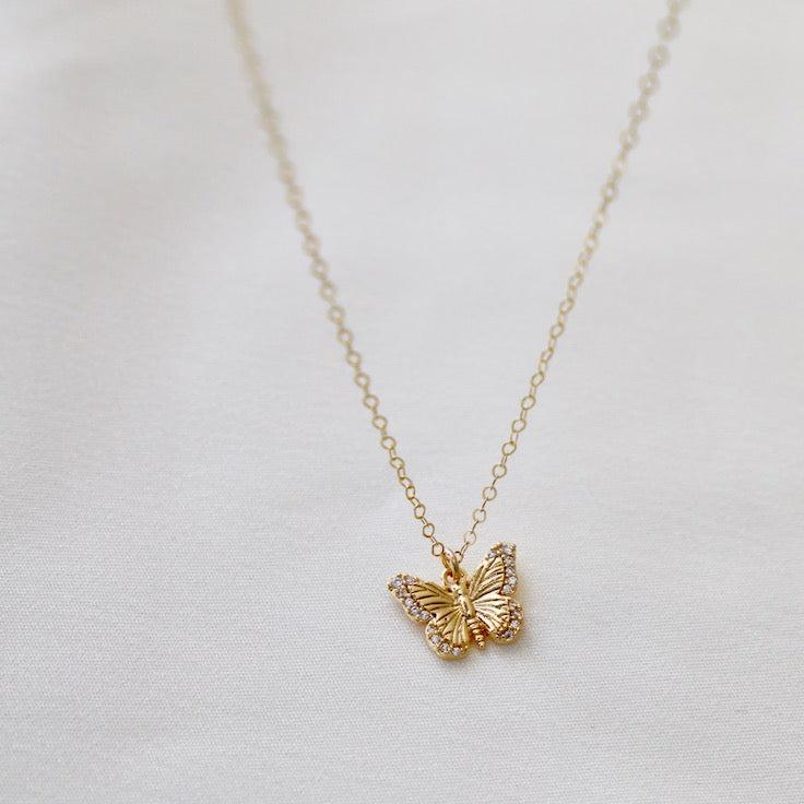 Delicate and sweet, this cubic zirconia butterfly necklace is a larger version to our Miniature CZ Butterfly Necklace. Butterflies symbolize transformation and hope which will make this a beautiful addition to your collection