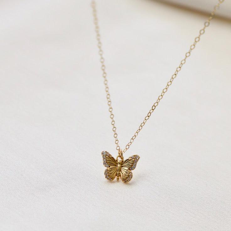 Delicate and sweet, this cubic zirconia butterfly necklace is a larger version to our Miniature CZ Butterfly Necklace. Butterflies symbolize transformation and hope which will make this a beautiful addition to your collection