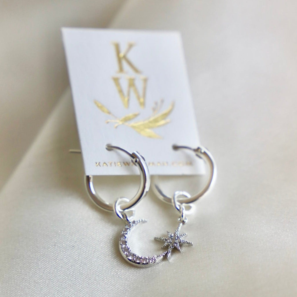 Our most loved earring, the Celestial Star and Moon Hoops&nbsp;are mis-matched perfection. This whimsical pair can be worn together or paired with another style. You can also slide the moon and star charms off for a great staple pair of small hoop earrings.