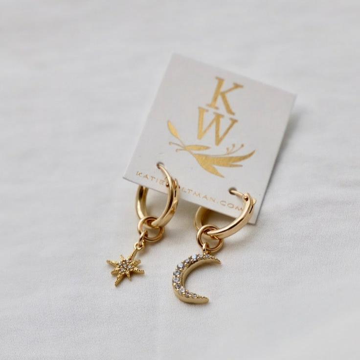 Our most loved earring, the Celestial Star and Moon Hoops are mis-matched perfection. This whimsical pair can be worn together or paired with another style. You can also slide the moon and star charms off for a great staple pair of small hoop earrings.