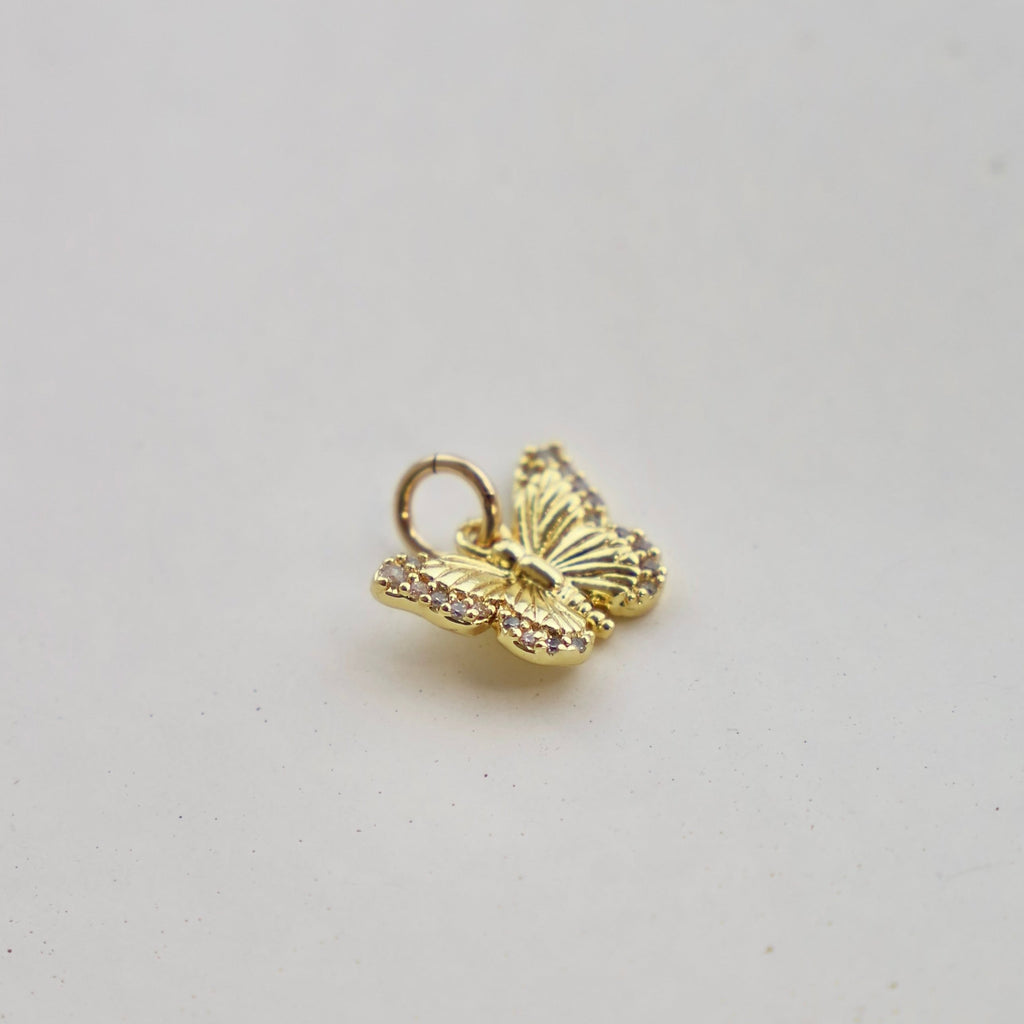 Delicate and sweet, this cubic zirconia butterfly charm is beautiful on its own or as an addition to any necklace.&nbsp;