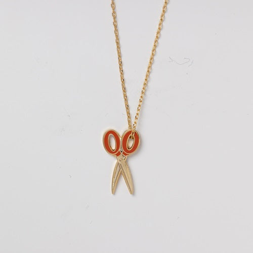 Scissors&nbsp;Pendant is gilded in luminous 22-karat gold on a soldered 18-karat gold dipped chain.

* Each pendant is about 1" (2.5 cm). Chain is 20" (50.8 cm) long with clasp.