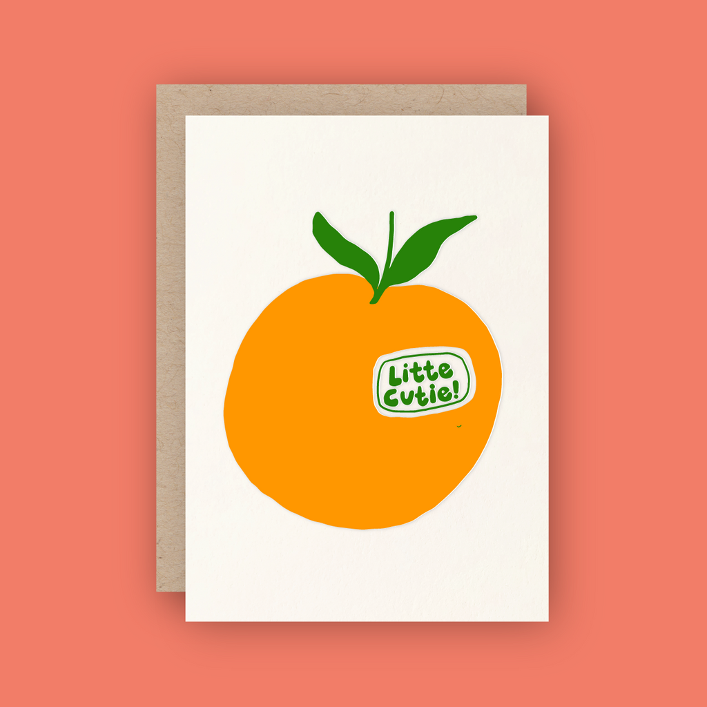 white card with an orange cutie reading "little cutie!"