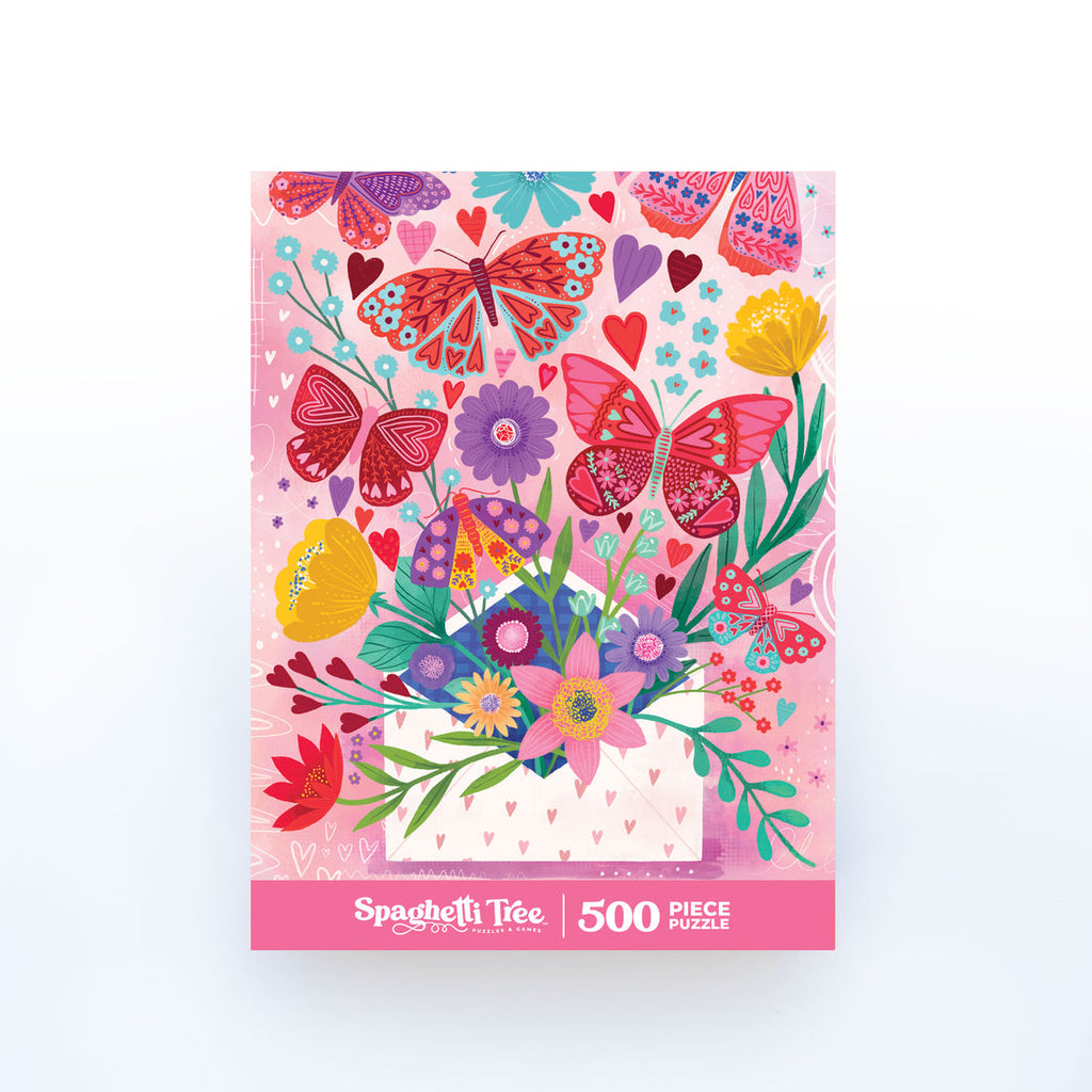 pink puzzle featuring an envelop, flowers, and butterflies