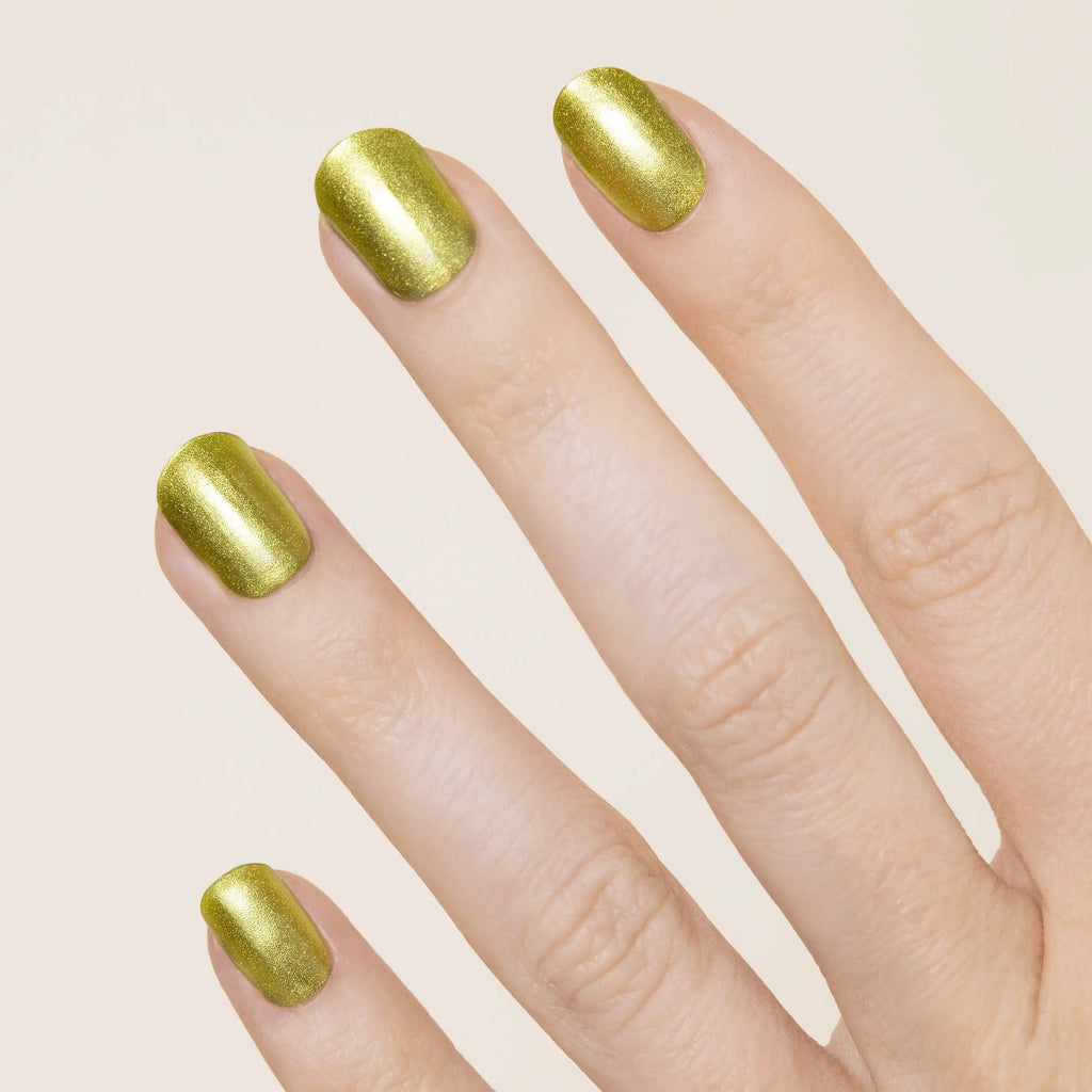 Shimmery, metallic lime green chrome nails. Appears more metallic upon application.