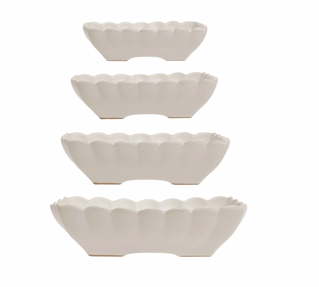 Be the host(ess) with the mostest with these scallop-edged serving dishes made of sturdy stoneware. Durable, timeless, and perfect for everything from fancy dinner parties to laid-back potlucks. 8 1/2" Square x 2-3/4"H