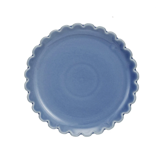 Add a touch of whimsy to your dining experience with our stoneware plate in blue. The scalloped edge adds a playful twist to any meal. Made from durable stoneware, this plate is both functional and charming. Serve up your favorite dishes with style! 8" Round