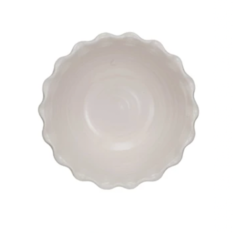 Add a touch of whimsy to your dining experience with this stoneware scalloped edge bowl in white. The scalloped edge adds a playful twist to any meal. Made from durable stoneware, this bowl is both functional and charming. 10" Round x 4"H